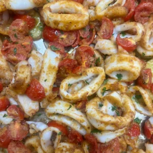 Calamari gratinati al forno con pomodorini